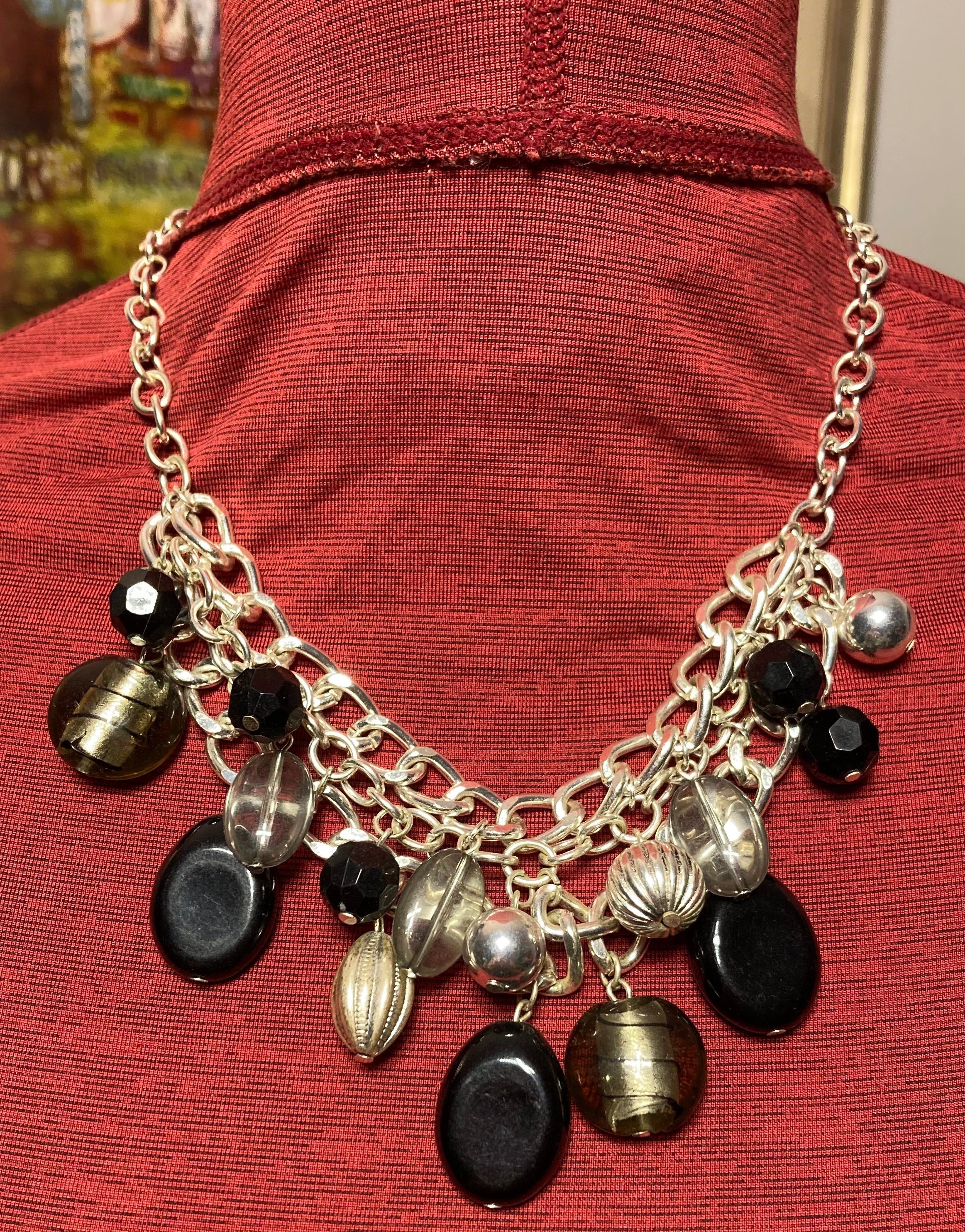 18 inch vintage dangling black beads. Silvertone curb chain links bib necklace.