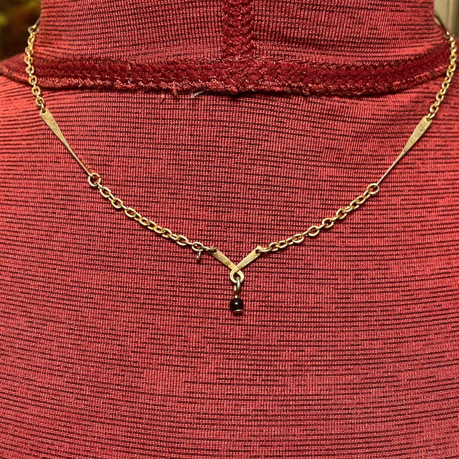 Vintage Avon, gold tone chain with twisted bar, vintage necklace and twisted bar pendant with hanging black bead 15 inch necklace
