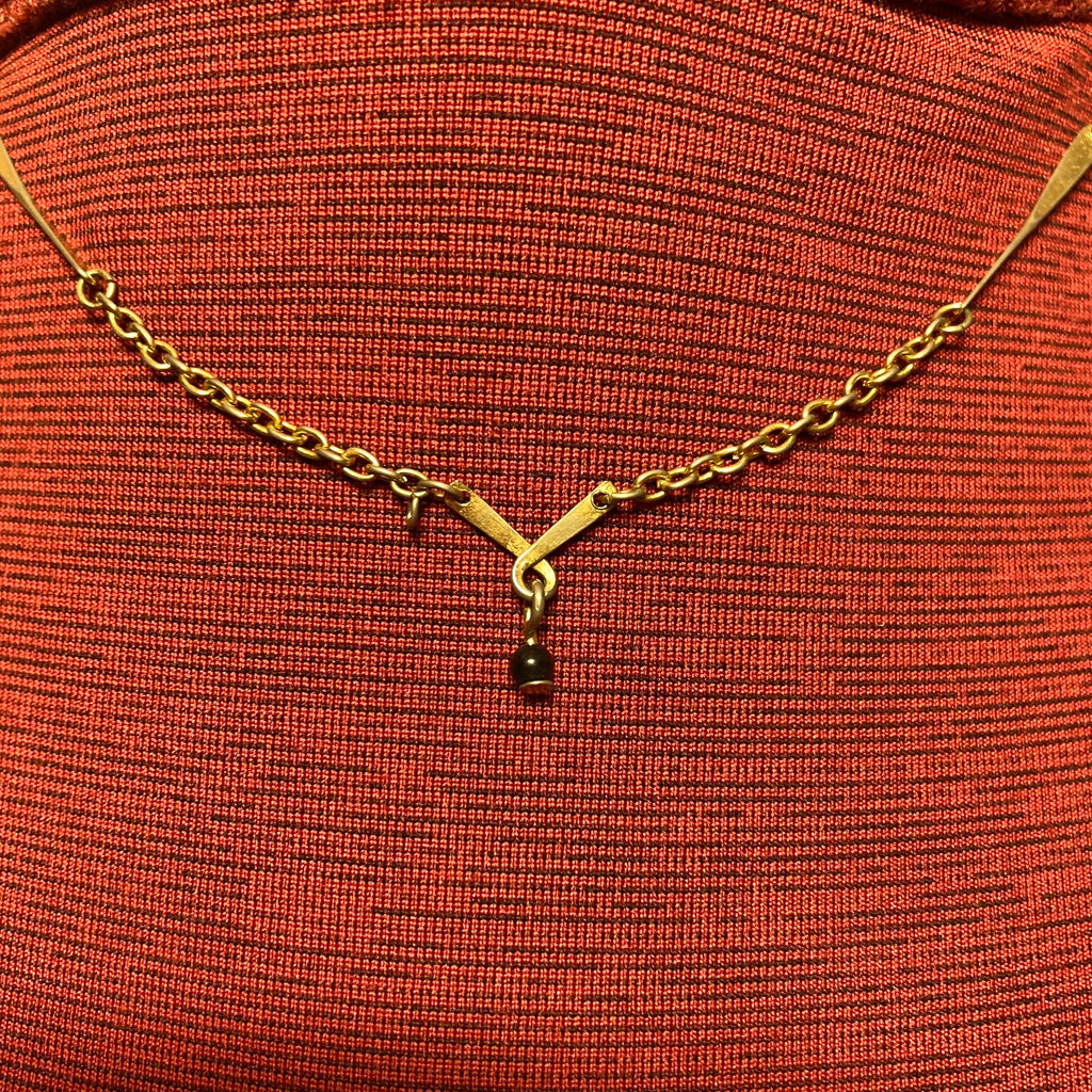 Vintage Avon, gold tone chain with twisted bar, vintage necklace and twisted bar pendant with hanging black bead 15 inch necklace