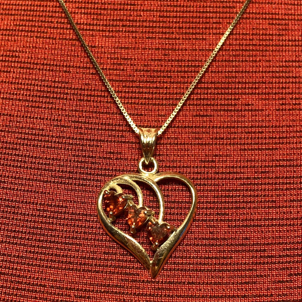 Vintage 14 karat white gold heart pendant with 3 heart shaped garnets and 20" chain from Italy