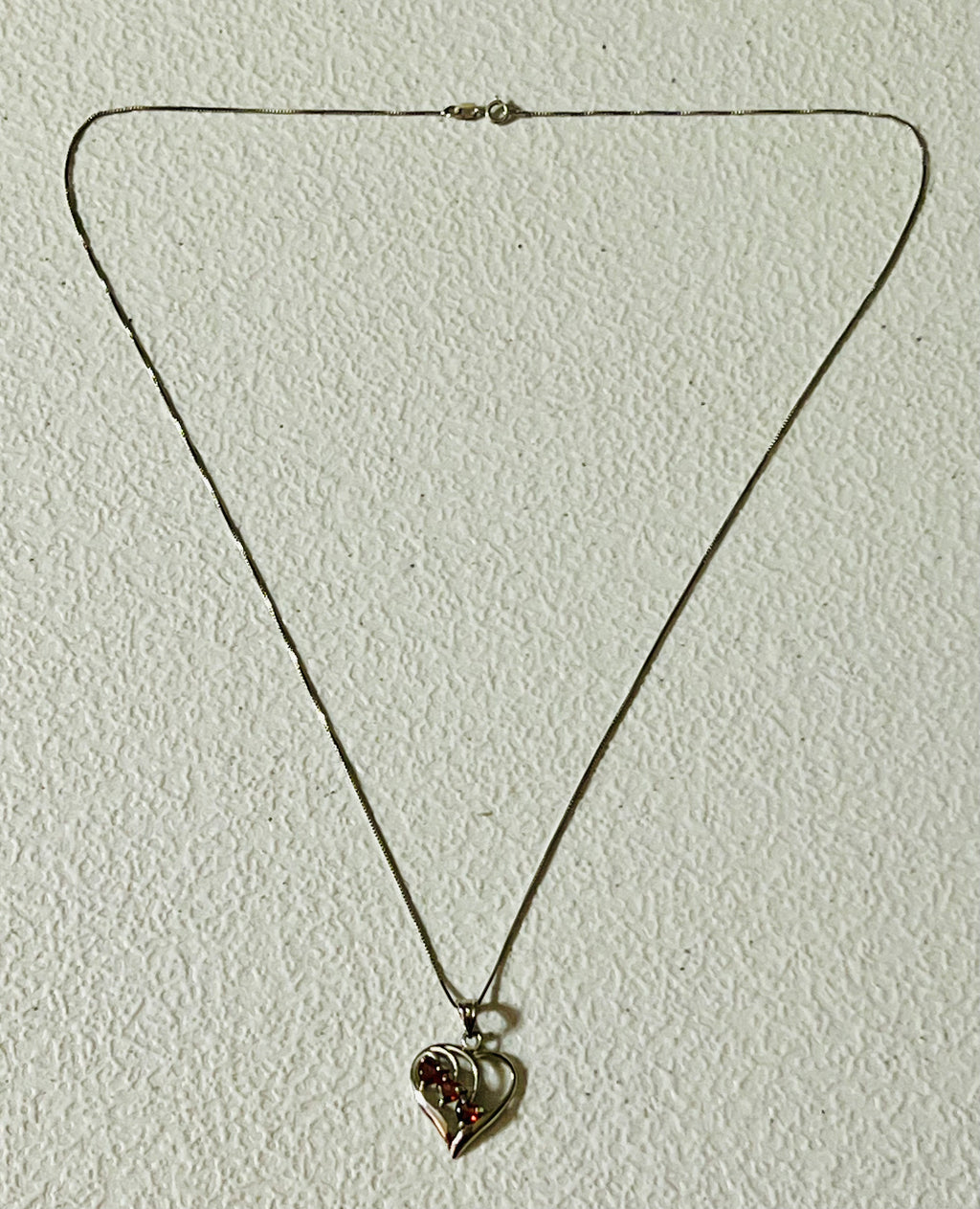 Vintage 14 karat white gold heart pendant with 3 heart shaped garnets and 20" chain from Italy