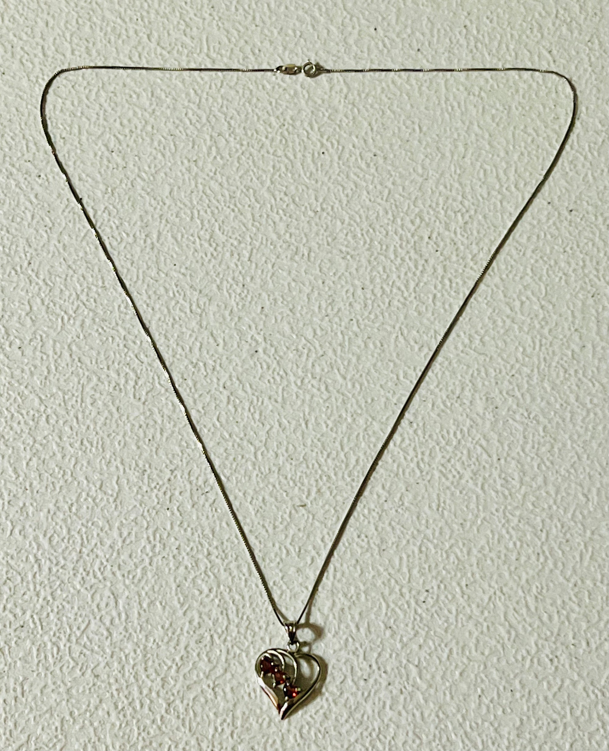 Vintage 14 karat white gold heart pendant with 3 heart shaped garnets and 20" chain from Italy