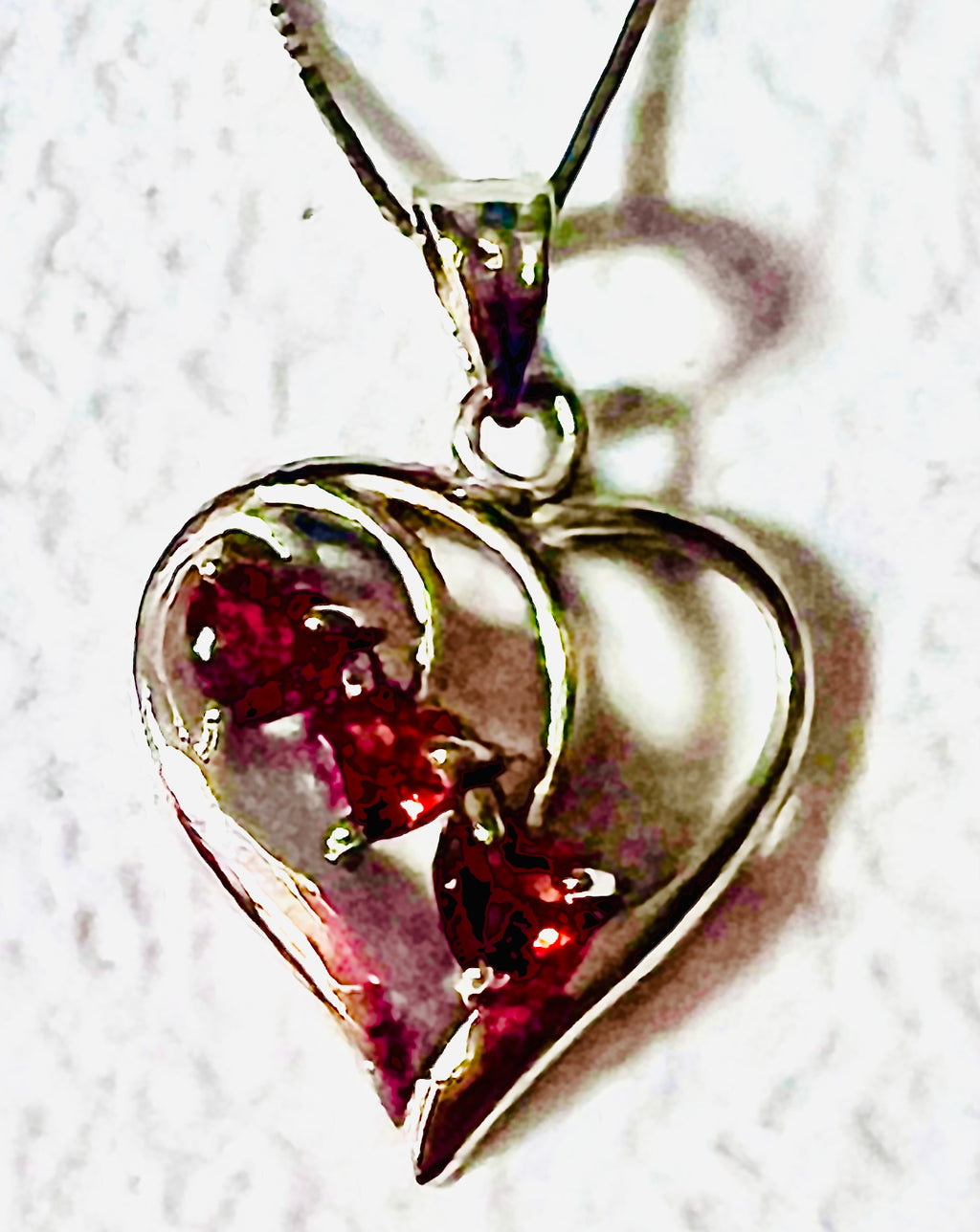 Vintage 14 karat white gold heart pendant with 3 heart shaped garnets and 20" chain from Italy