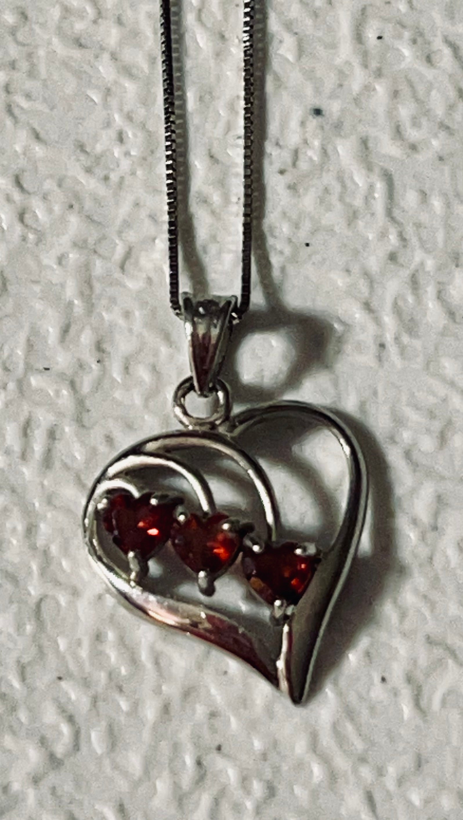 Vintage 14 karat white gold heart pendant with 3 heart shaped garnets and 20" chain from Italy