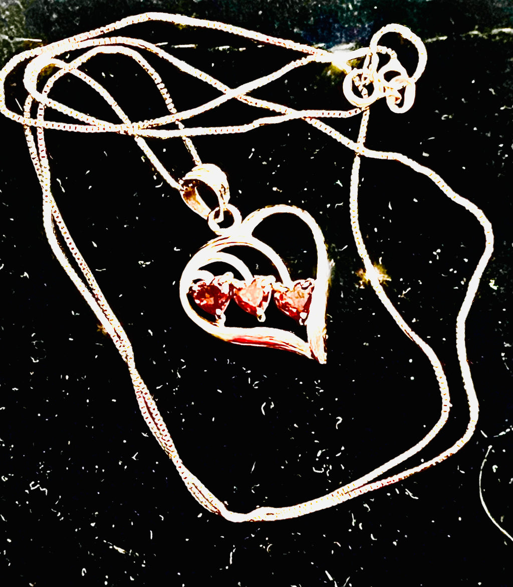 Vintage 14 karat white gold heart pendant with 3 heart shaped garnets and 20" chain from Italy
