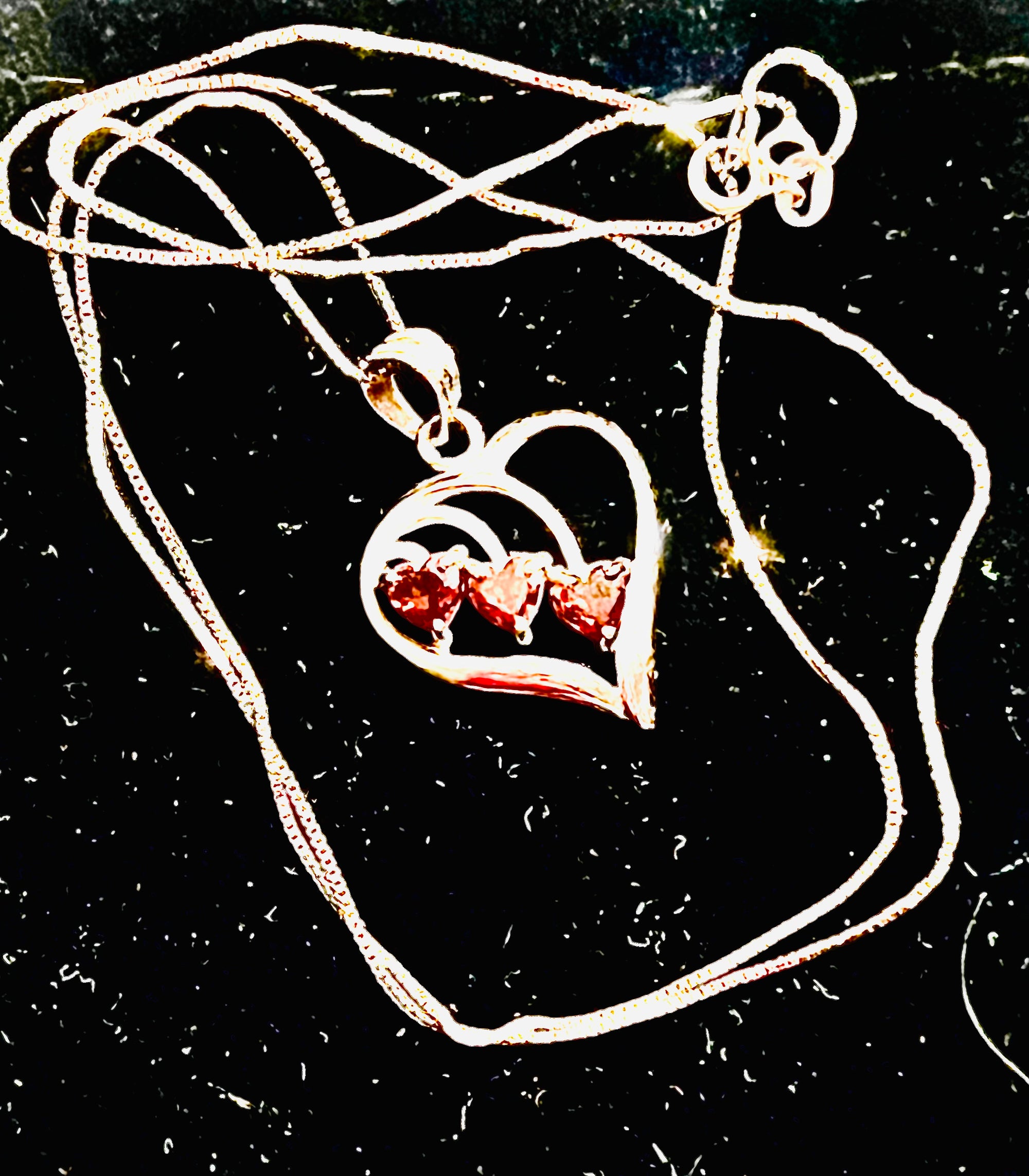 Vintage 14 karat white gold heart pendant with 3 heart shaped garnets and 20" chain from Italy
