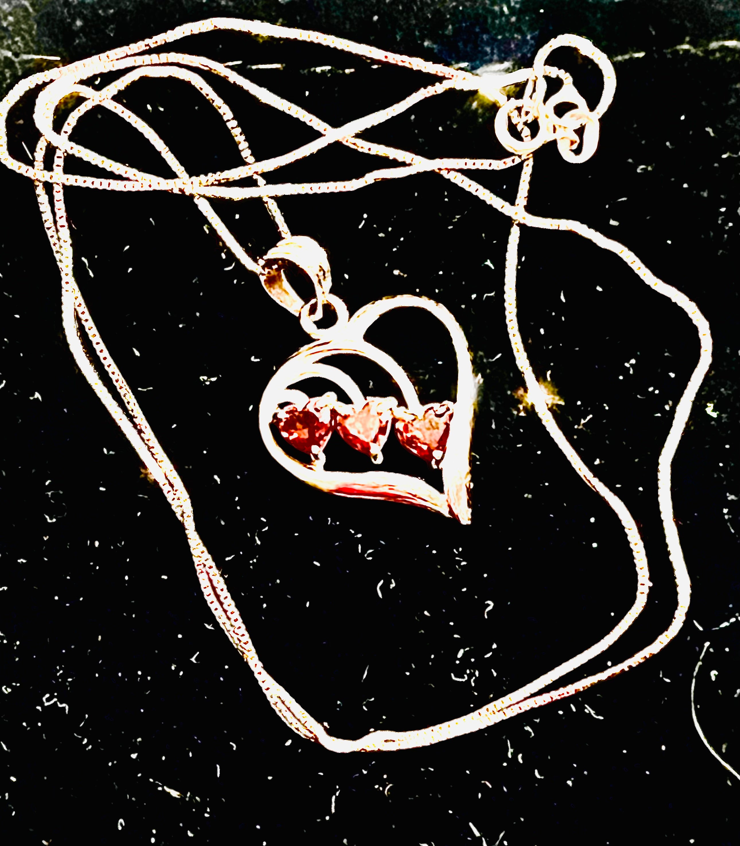 Vintage 14 karat white gold heart pendant with 3 heart shaped garnets and 20" chain from Italy